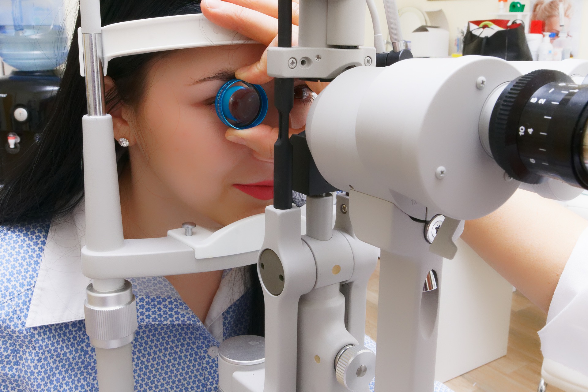 A person getting their eyes tested by an optician