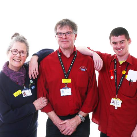 Three Barnsley Hospital volunteers smiling